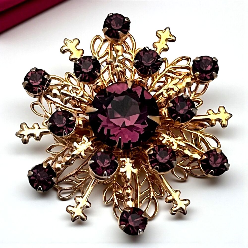 Vintage 1960s Starburst Brooch Purple Rhinestone Gold Tone Mid Century - 4Z